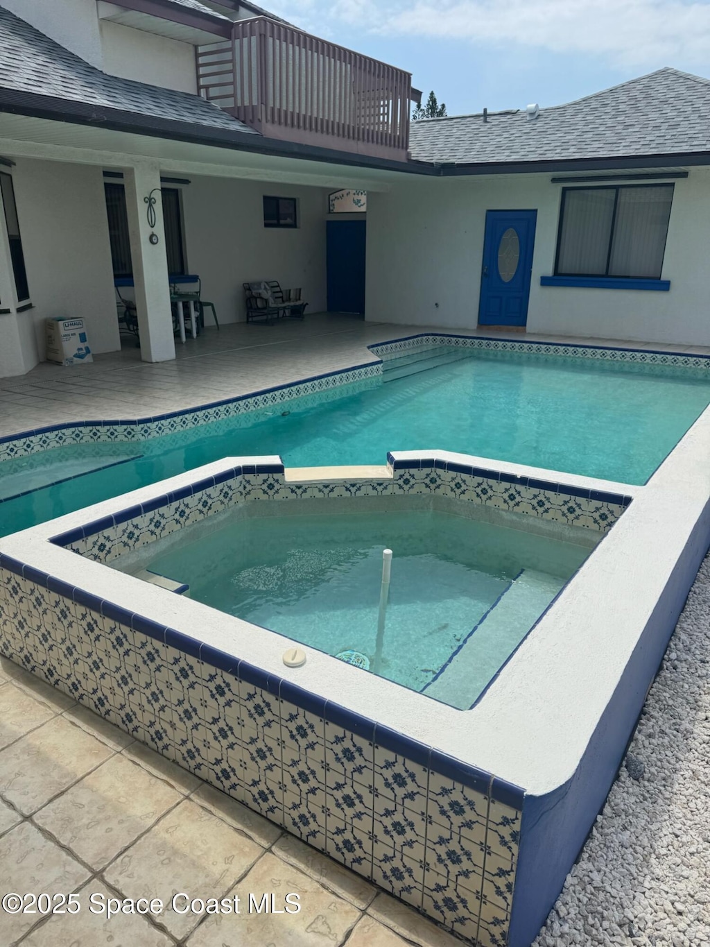 240 Sheridan Ave, Satellite Beach, FL 32937 - view of pool with a pool with connected hot tub and a patio area