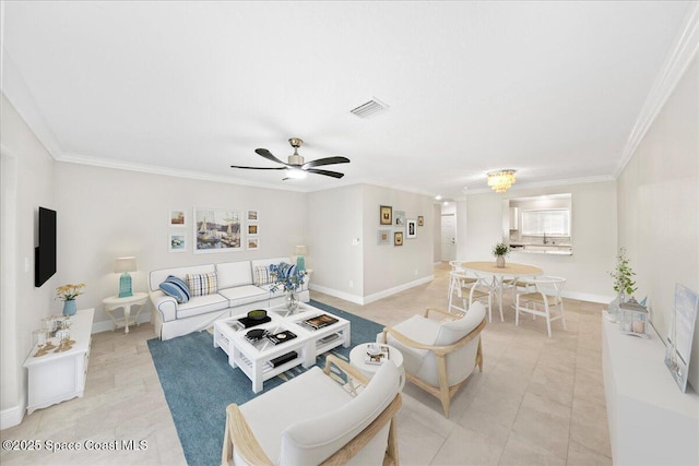 203 6th Ave Unit 9, Melbourne Beach, FL 32951 - living area with crown molding, a ceiling fan, and light tile patterned flooring