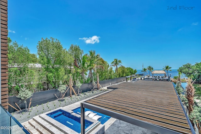 16 Seaside Ave, Key Largo, FL 33037 - exterior view of a hot tub and a fenced backyard