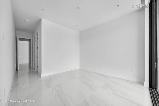 16 Seaside Ave, Key Largo, FL 33037 - empty room with marble finish floors and a smoke detector