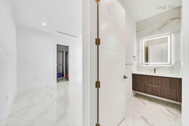 16 Seaside Ave, Key Largo, FL 33037 - bathroom with marble finish flooring, vanity, and recessed lighting
