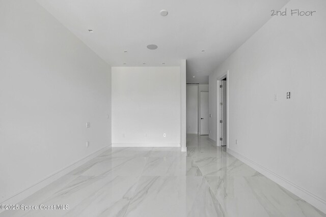 16 Seaside Ave, Key Largo, FL 33037 - spare room with light marble finish flooring
