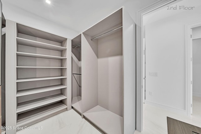 16 Seaside Ave, Key Largo, FL 33037 - spacious closet featuring marble finish floors