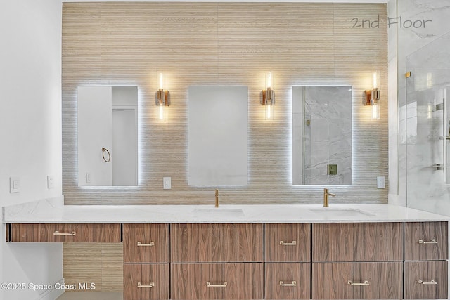 16 Seaside Ave, Key Largo, FL 33037 - full bath with double vanity and a marble finish shower