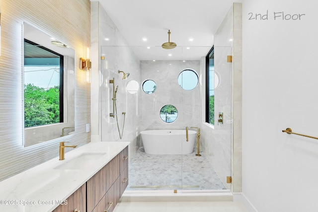16 Seaside Ave, Key Largo, FL 33037 - full bath with vanity, a marble finish shower, and a freestanding tub
