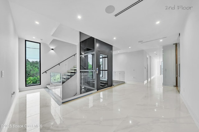 16 Seaside Ave, Key Largo, FL 33037 - hallway with stairs, marble tiled flooring, and recessed lighting
