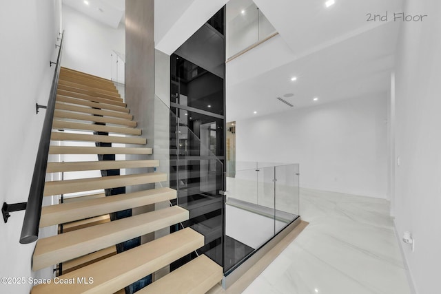 16 Seaside Ave, Key Largo, FL 33037 - stairway featuring a towering ceiling