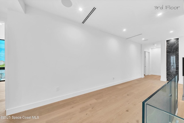 16 Seaside Ave, Key Largo, FL 33037 - unfurnished room featuring light wood-style flooring and recessed lighting