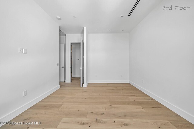 16 Seaside Ave, Key Largo, FL 33037 - spare room featuring light wood-type flooring and a smoke detector