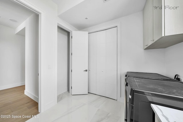 16 Seaside Ave, Key Largo, FL 33037 - laundry area with cabinet space and washer and dryer