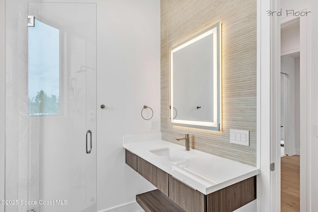16 Seaside Ave, Key Largo, FL 33037 - full bathroom featuring decorative backsplash, vanity, and a stall shower