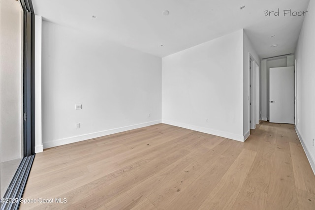 16 Seaside Ave, Key Largo, FL 33037 - unfurnished room featuring light wood finished floors and baseboards