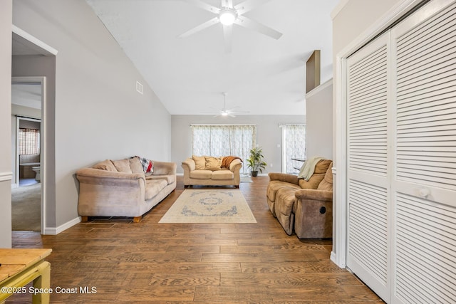 581 Jupiter Blvd NW, Palm Bay, FL 32907 - living room with a ceiling fan, dark wood-style flooring, and high vaulted ceiling