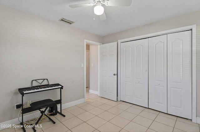 959 Macco Rd, Cocoa, FL 32927 - bedroom with a closet, light tile patterned floors, and ceiling fan