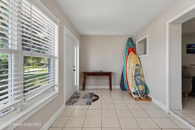 959 Macco Rd, Cocoa, FL 32927 - foyer featuring plenty of natural light and light tile patterned floors
