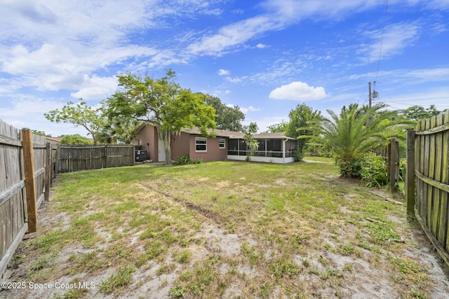 959 Macco Rd, Cocoa, FL 32927 - fenced backyard with a sunroom