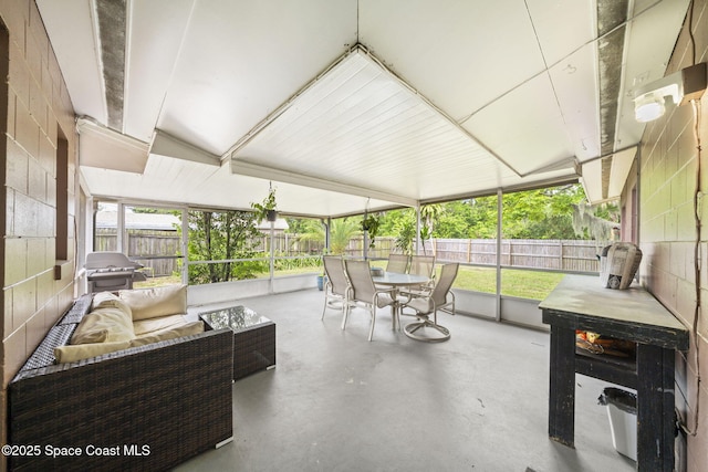959 Macco Rd, Cocoa, FL 32927 - sunroom featuring outdoor lounge area, outdoor dining space, and plenty of natural light