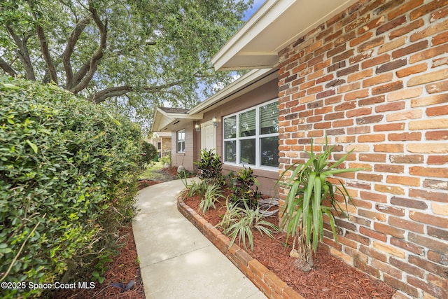 959 Macco Rd, Cocoa, FL 32927 - view of exterior entry featuring brick siding