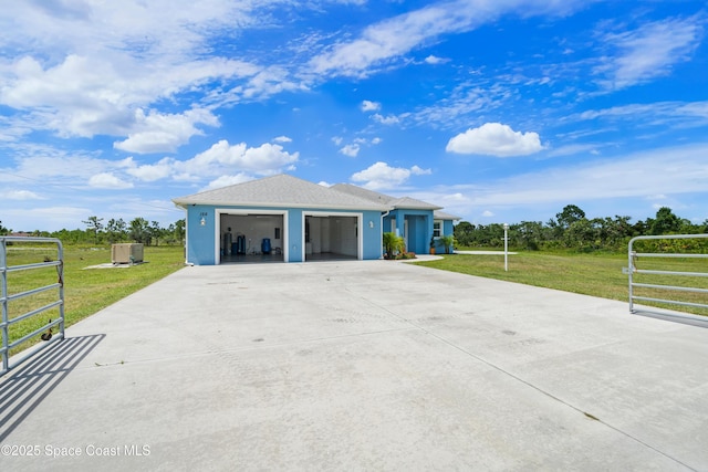 156 Puddle Duck Ln, Grant-Valkaria, FL 32909 - garage featuring driveway