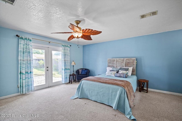 3664 Longbow Rd, Cocoa, FL 32926 - bedroom with french doors, access to outside, carpet flooring, a textured ceiling, and ceiling fan