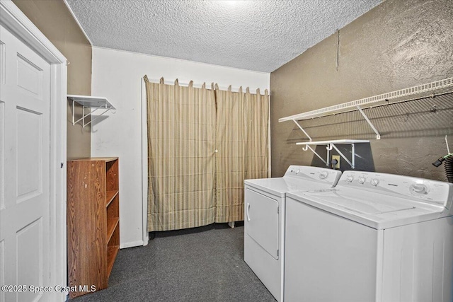 3664 Longbow Rd, Cocoa, FL 32926 - laundry room featuring washing machine and dryer and a textured ceiling