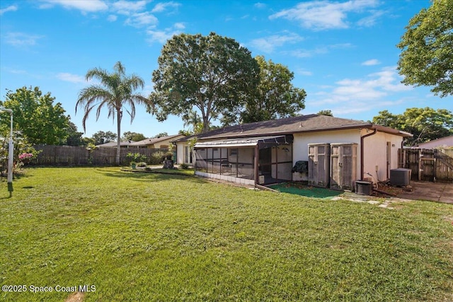 3664 Longbow Rd, Cocoa, FL 32926 - fenced backyard featuring a sunroom
