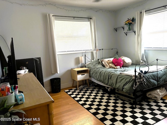 292 Pine Tree Dr, Indialantic, FL 32903 - bedroom featuring light wood-type flooring