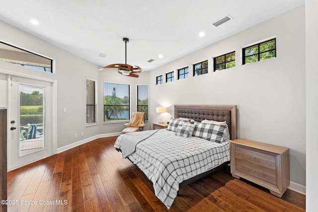 7987 Bradwick Way, Melbourne, FL 32940 - bedroom featuring access to outside, hardwood / wood-style floors, and recessed lighting