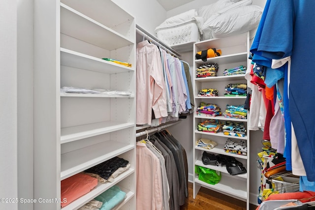 7987 Bradwick Way, Melbourne, FL 32940 - spacious closet featuring wood finished floors