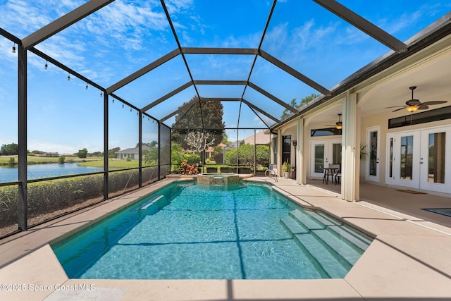 7987 Bradwick Way, Melbourne, FL 32940 - view of swimming pool featuring french doors, a water view, a patio area, a ceiling fan, and a lanai