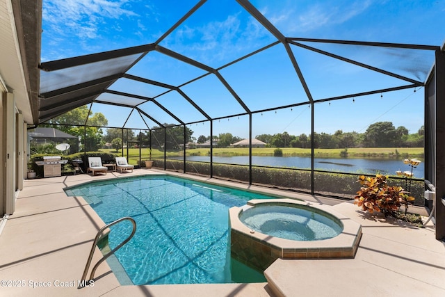 7987 Bradwick Way, Melbourne, FL 32940 - view of swimming pool featuring a pool with connected hot tub, a patio, a water view, area for grilling, and glass enclosure