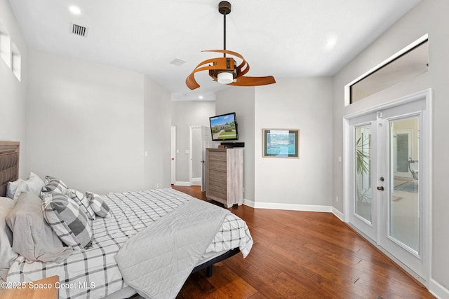 7987 Bradwick Way, Melbourne, FL 32940 - bedroom featuring access to outside, wood finished floors, recessed lighting, ceiling fan, and french doors
