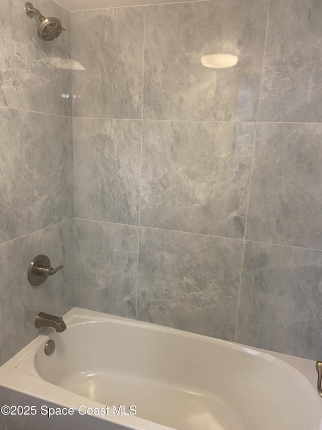 520 Palm Springs Blvd Unit 102, Indian Harbour Beach, FL 32937 - full bathroom featuring shower / tub combination