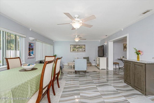 955 Bartlett Ln, Rockledge, FL 32955 - dining area with ornamental molding and ceiling fan