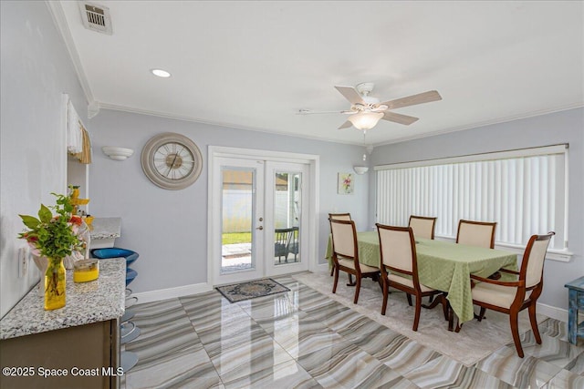 955 Bartlett Ln, Rockledge, FL 32955 - dining area with french doors, ornamental molding, and ceiling fan