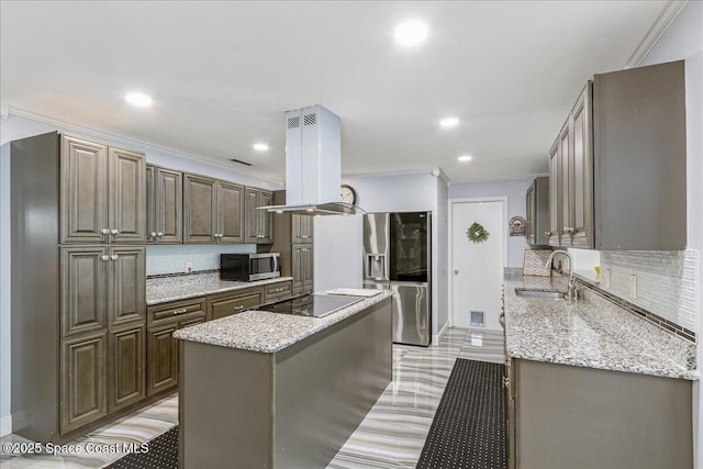 955 Bartlett Ln, Rockledge, FL 32955 - kitchen featuring stainless steel appliances, island range hood, tasteful backsplash, ornamental molding, and light stone counters