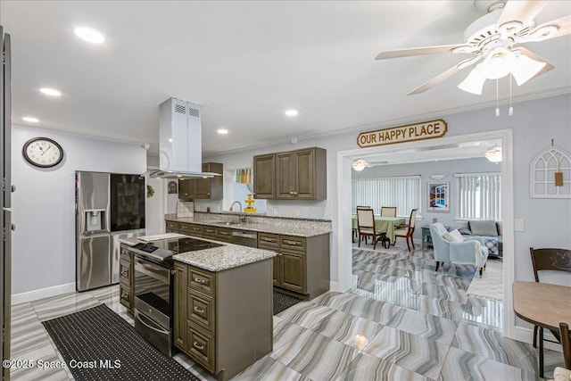 955 Bartlett Ln, Rockledge, FL 32955 - kitchen with appliances with stainless steel finishes, island exhaust hood, a kitchen island, a ceiling fan, and crown molding