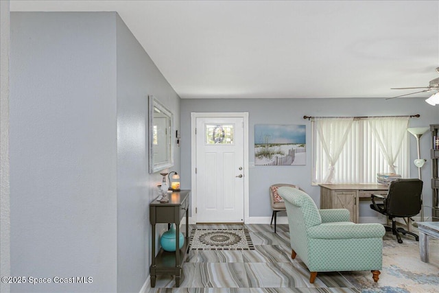 955 Bartlett Ln, Rockledge, FL 32955 - foyer with baseboards and ceiling fan