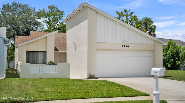 1734 Bluebird Ct, Melbourne, FL 32935 - mid-century modern home featuring a shingled roof, a front lawn, a garage, and stucco siding