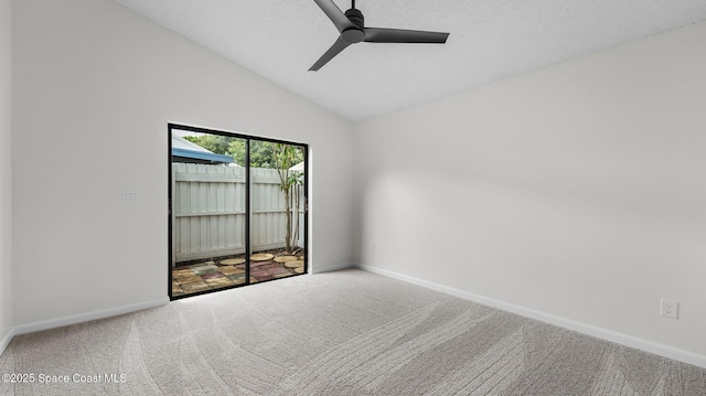 1734 Bluebird Ct, Melbourne, FL 32935 - carpeted empty room with ceiling fan, vaulted ceiling, and a textured ceiling