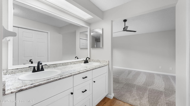 1734 Bluebird Ct, Melbourne, FL 32935 - full bath featuring double vanity and baseboards