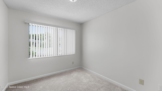 1734 Bluebird Ct, Melbourne, FL 32935 - spare room featuring carpet flooring and a textured ceiling