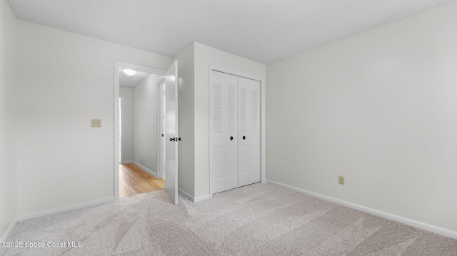 1734 Bluebird Ct, Melbourne, FL 32935 - unfurnished bedroom featuring carpet flooring and a closet