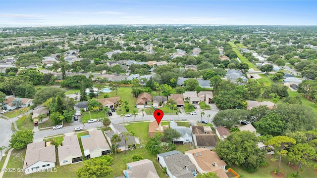 1734 Bluebird Ct, Melbourne, FL 32935 - aerial view of property and surrounding area with nearby suburban area