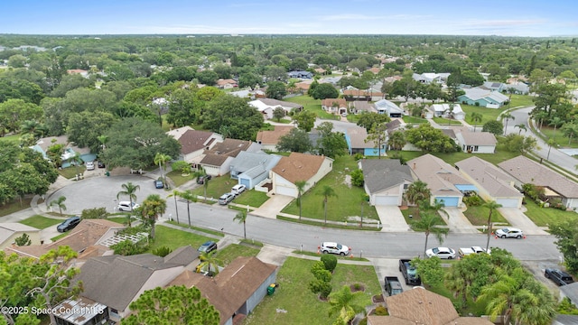 1734 Bluebird Ct, Melbourne, FL 32935 - aerial overview of property's location featuring nearby suburban area