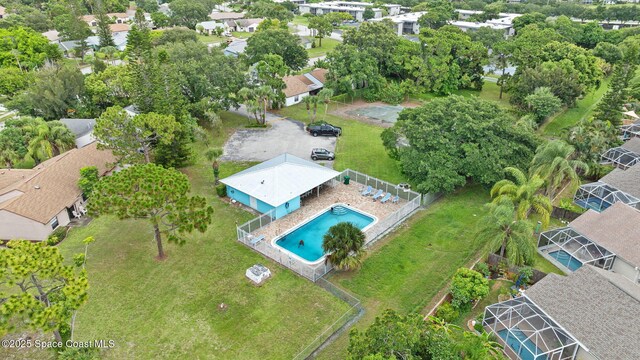 1734 Bluebird Ct, Melbourne, FL 32935 - aerial view of property's location with a pool and nearby suburban area