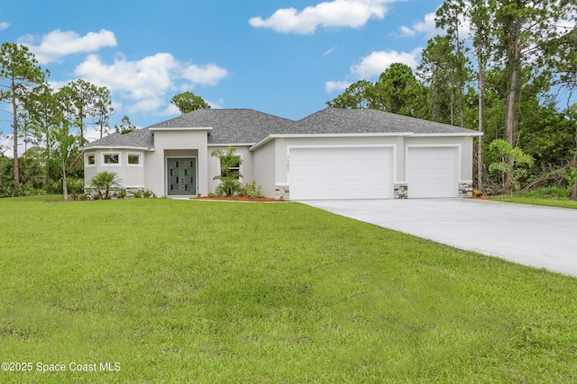 8025 Babcock St SE, Grant-Valkaria, FL 32909 - prairie-style house with a garage, concrete driveway, a front yard, stucco siding, and a shingled roof