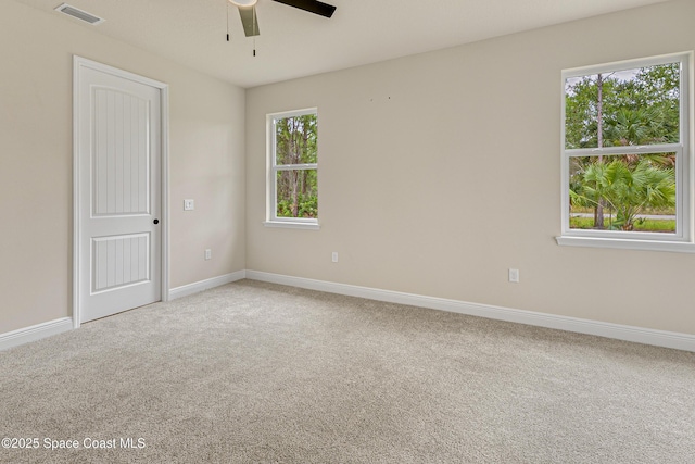 8025 Babcock St SE, Grant-Valkaria, FL 32909 - carpeted empty room with a ceiling fan and baseboards