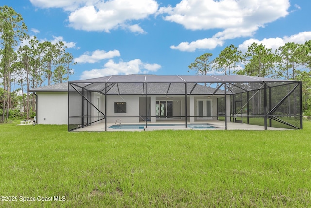 8025 Babcock St SE, Grant-Valkaria, FL 32909 - back of property featuring ceiling fan, a lawn, and a patio area