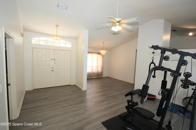 1366 17th Pl SW, Vero Beach, FL 32962 - workout area featuring lofted ceiling, wood finished floors, a chandelier, and a ceiling fan